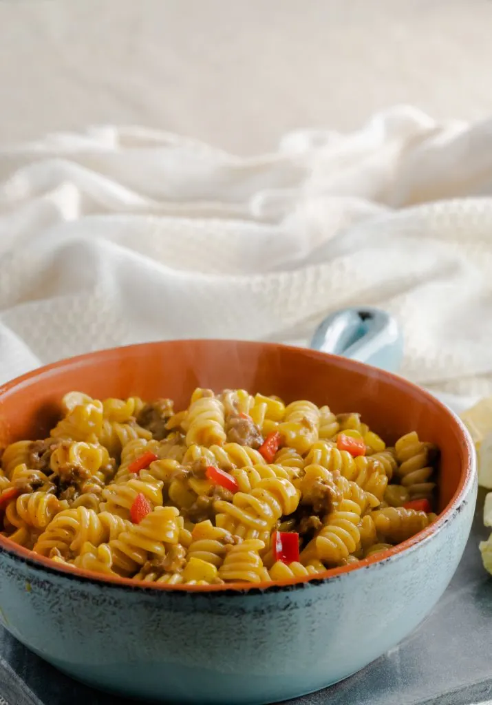 Instant Pot taco pasta made with rotini noodles, red peppers, and super sweet corn.