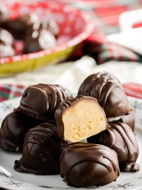 Gluten free peanut butter balls coated in melted chocolate.