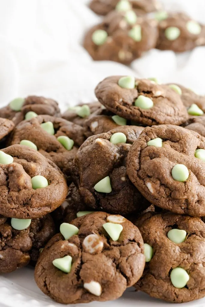 Close up of mint chocolate chip cookies mixed with white chocolate chips. 