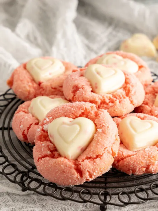 Strawberry Blossom Cookies with Hershey white heart candies centered in the middle.